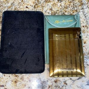 Vintage Elgin American cigarette holder and lighte